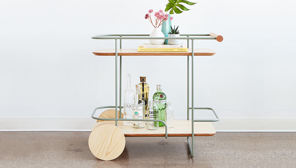 Gus* Modern Arcade Bar Cart in a styled room setting