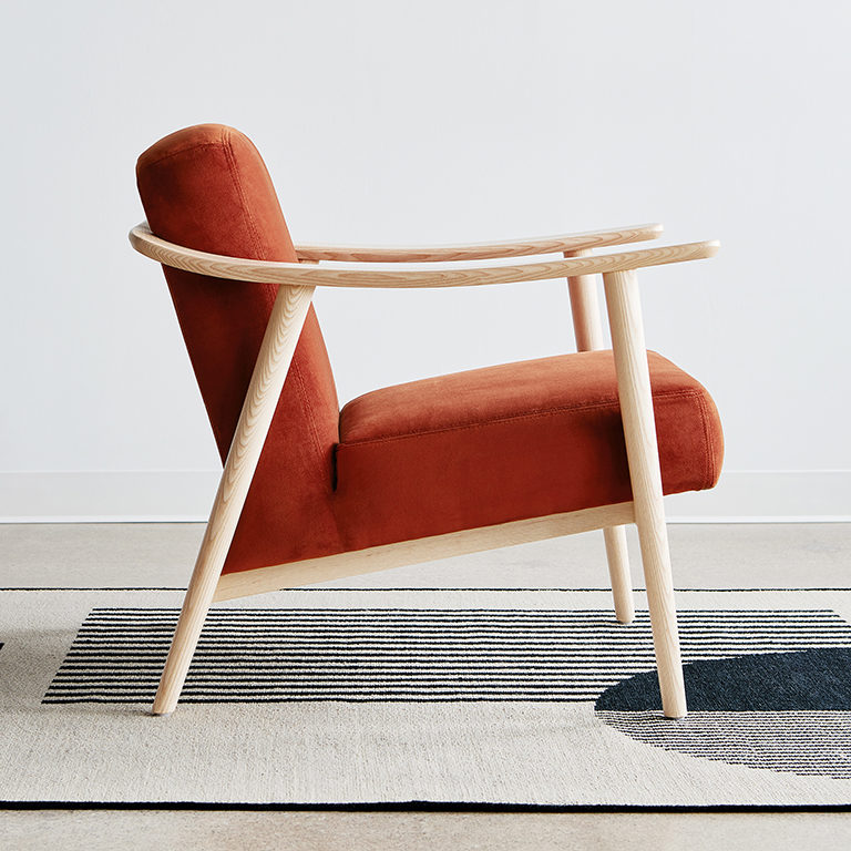 Gus* Modern Baltic Chair Fabric Upholstery in a styled room setting