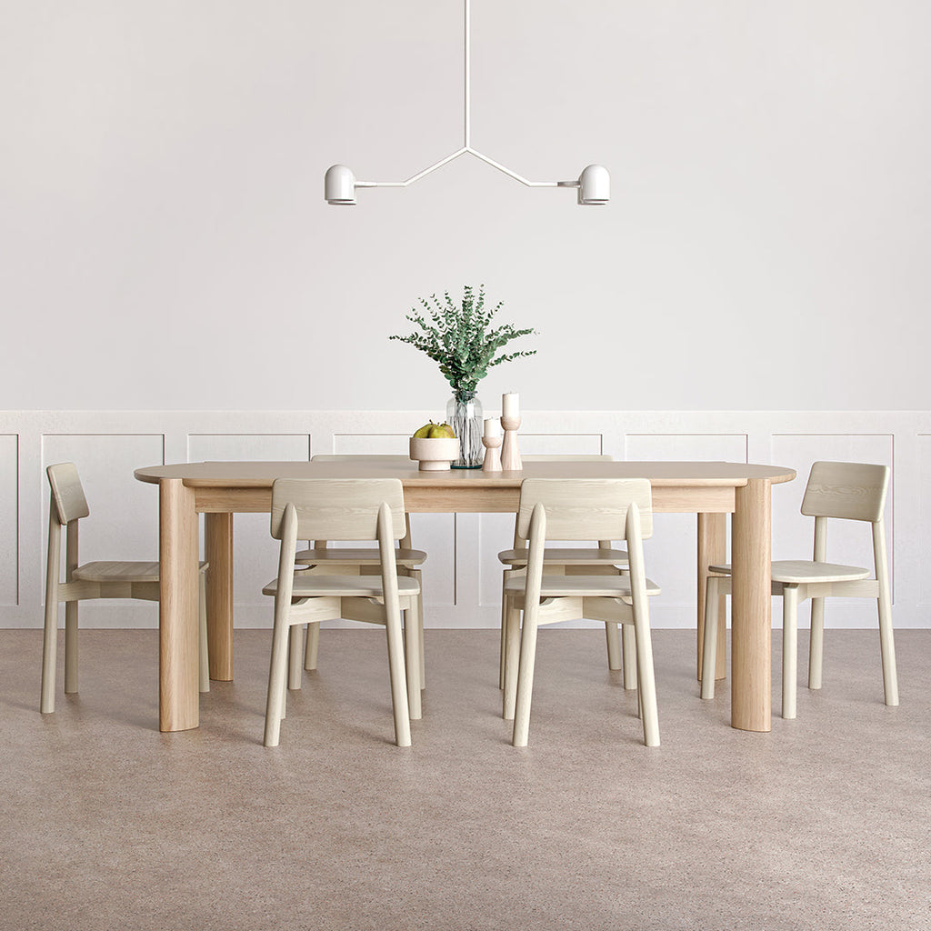 Gus* Modern Bancroft Dining Table in a styled room setting