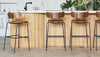 Gus* Modern Bantam Barstool in a styled room setting