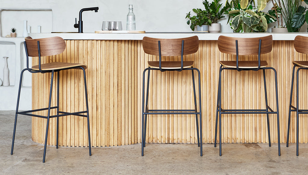 Gus* Modern Bantam Bar Stool in a styled room setting