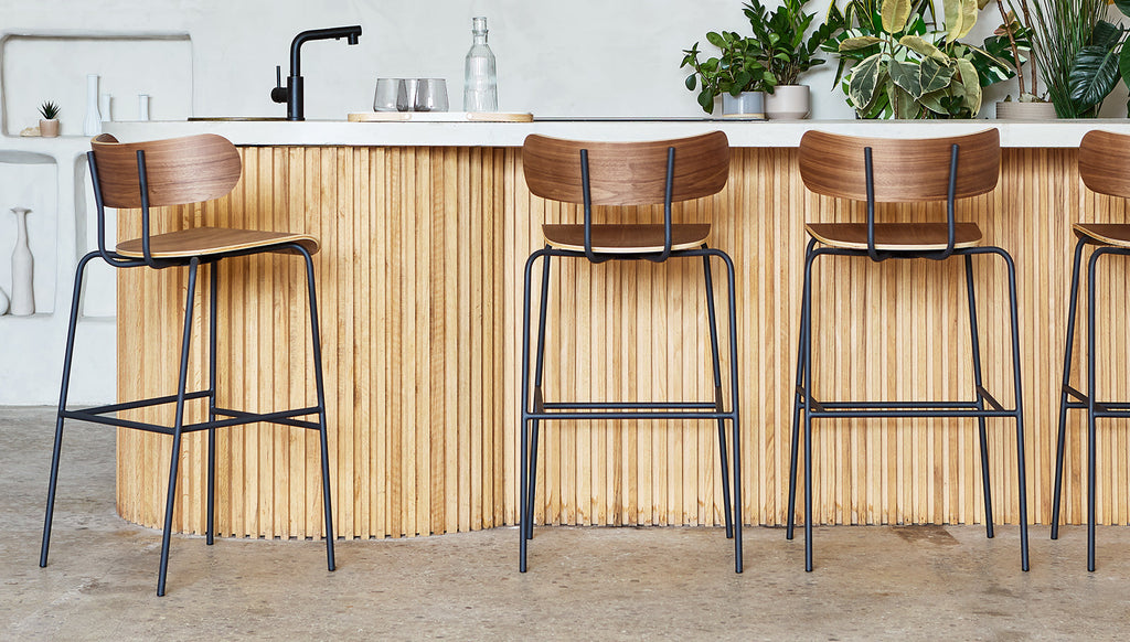 Gus* Modern Bantam Barstool in a styled room setting