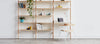 Gus* Modern Branch-1 Shelving Unit with Desk in a styled room setting