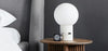 Gus* Modern Callisto Table Lamp in a styled room setting