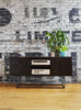 Gus* Modern Myles Media Stand in a styled room setting