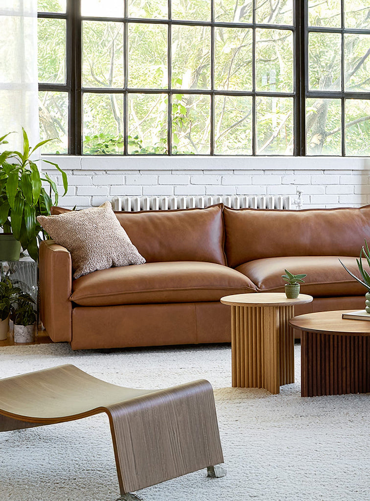 Gus* Modern Sola Sofa in a styled room setting