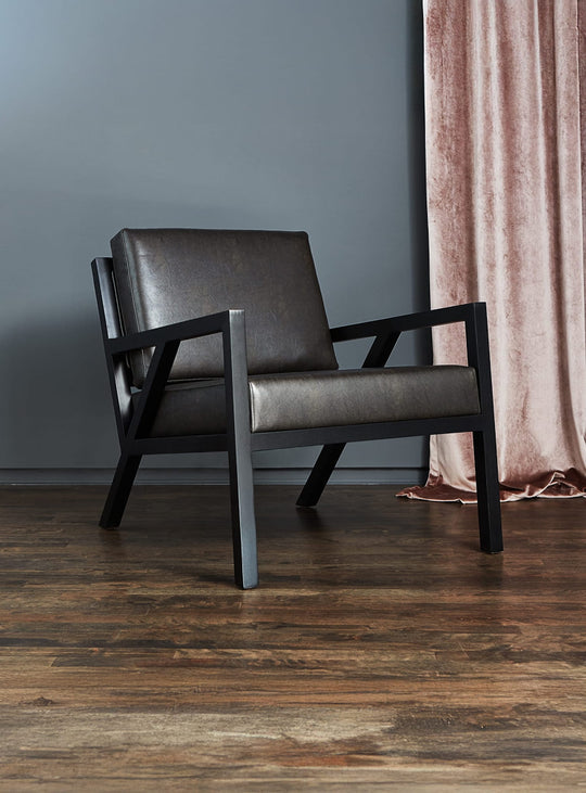 Gus* Modern Truss Chair in a styled room setting