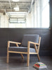 Gus* Modern Truss Chair in a styled room setting