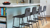 Gus* Modern Lecture Counter Stool (Upholstered) in a styled room setting