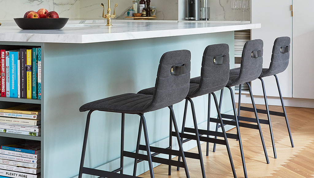 Gus* Modern Lecture Counter Stool (Upholstered) in a styled room setting