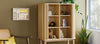 Gus* Modern Ledger Tall Cabinet in a styled room setting
