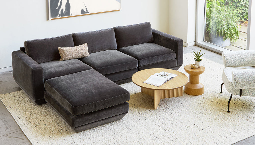 Gus* Modern Podium 4PC Sectional in a styled room setting