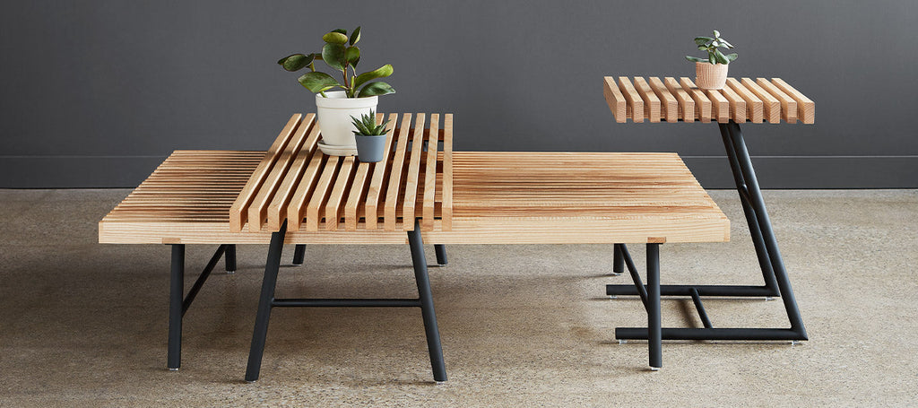 Gus* Modern Transit End Table in a styled room setting